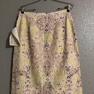 Lace beige skirt with touch of green and purple.